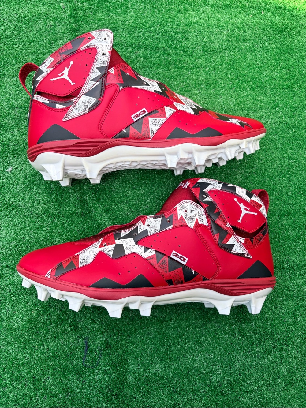 Jordan Kids' Red and Black Baseball Cleats with White Soles